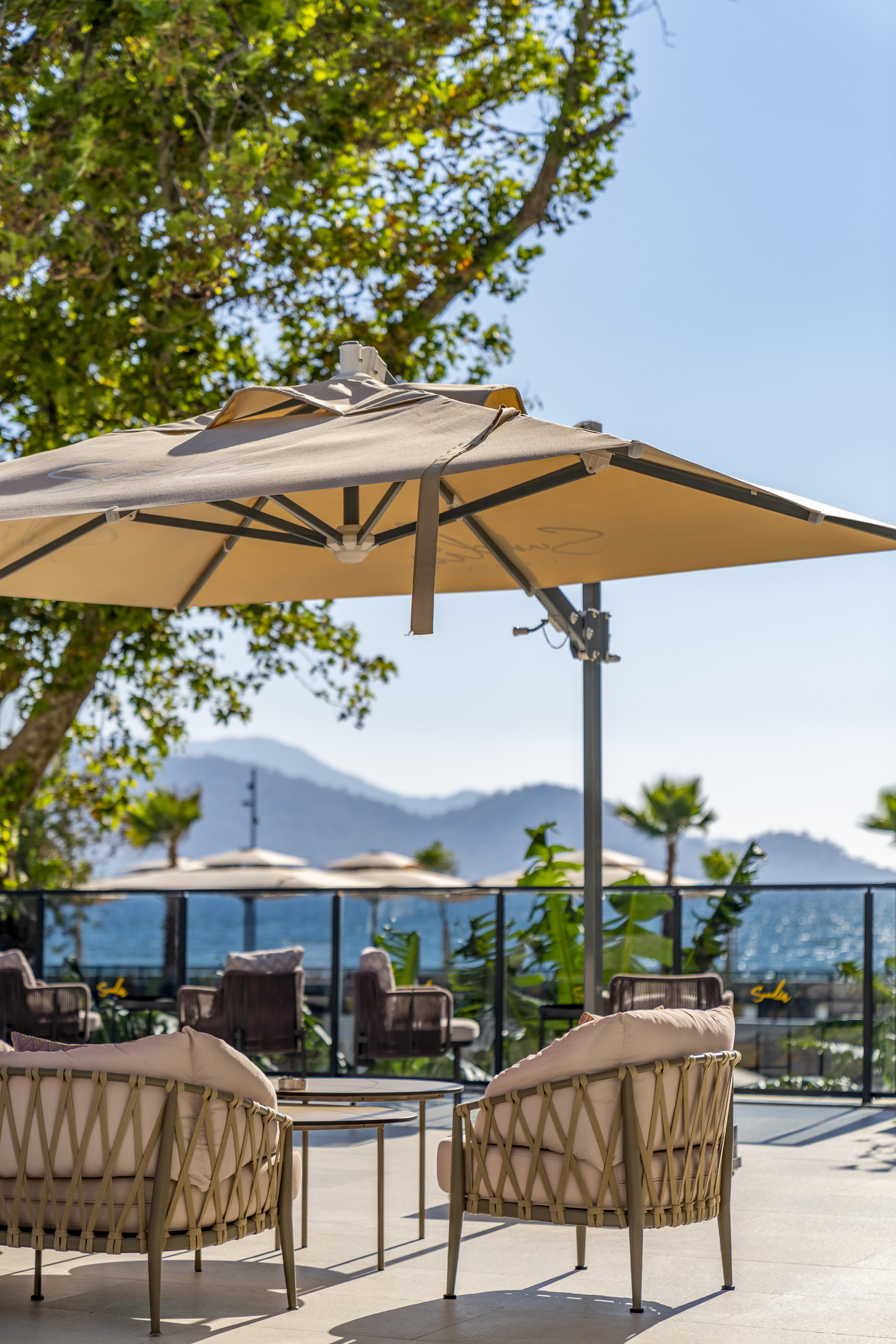 Hotel Sundia Exclusive By Liberty Fethiye Adults Only Exterior foto A cantilever umbrella